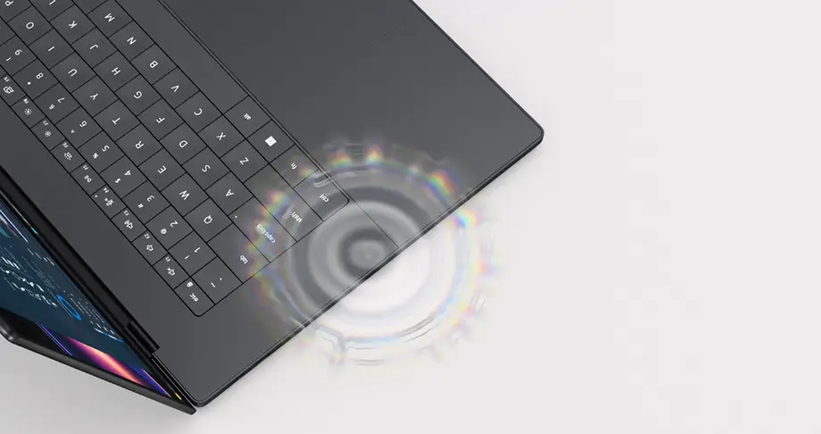 Zbliżenie na klawiaturę i touchpad laptopa Dell XPS 16
